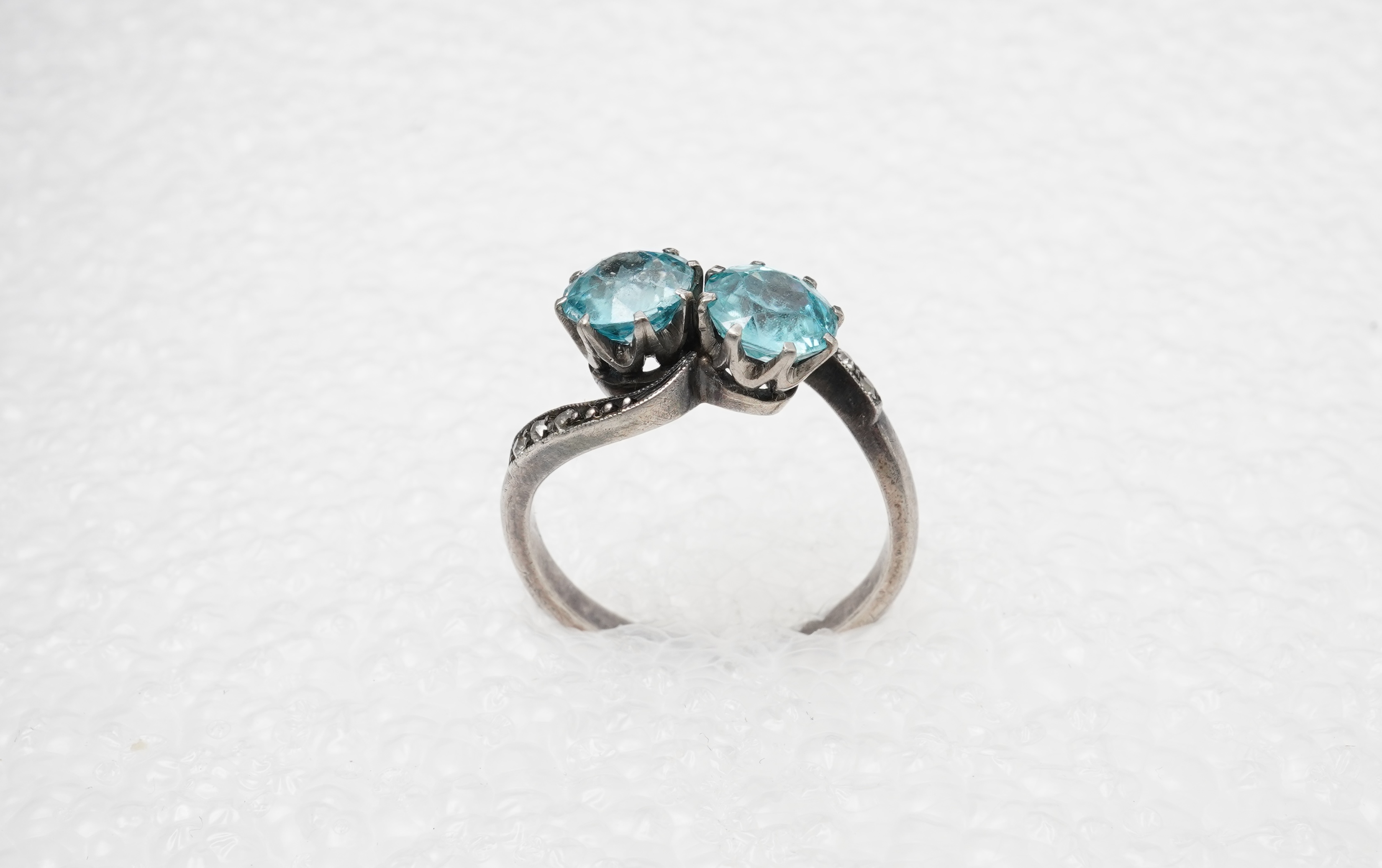 A zircon and diamond 'toi-et-moi' ring